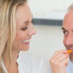 why does food stick to my teeth as i get older