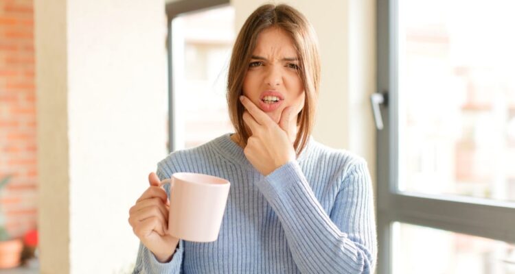 why are my teeth aching all of a sudden