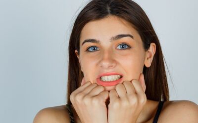 why do my bottom teeth feel tight